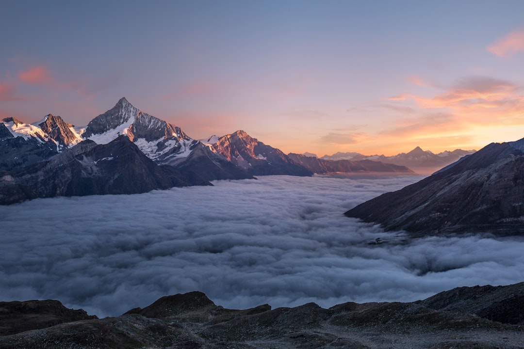 Photo of the Himalayas from Kala Padri in P Louisville, Af reimagined in the style of [Michael Shainblum](https://goo.gl/search?artist%20Michael%20Shainblum), dramatic sunset, mountain peaks above clouds, epic landscape, Nikon D850 –ar 128:85