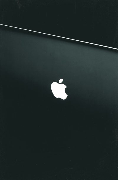 minimalist black wallpaper, apple macbook pro with the white logo on it, flat, minimal, black and white, high contrast, simple, grainy --ar 83:128