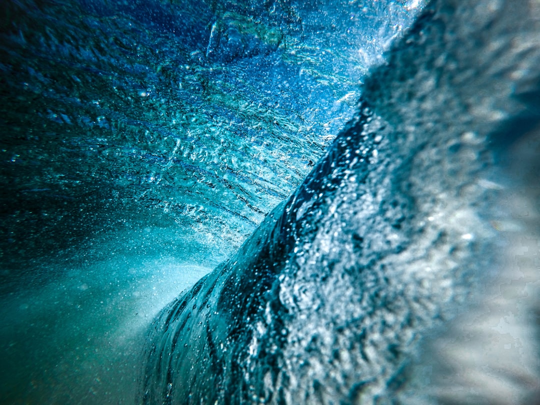 photo of an underwater view inside the barrel of perfect wave, surf photography style shot, Canon dslr –ar 4:3