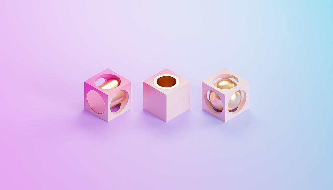 Three isometric cubes with rounded corners, each containing one gold sphere, are arranged in a gradient background of pink and purple. The three cubes form an intricate pattern on the right side of the frame, creating a symmetrical composition. Soft lighting highlights their glossy surfaces against a pastel backdrop.