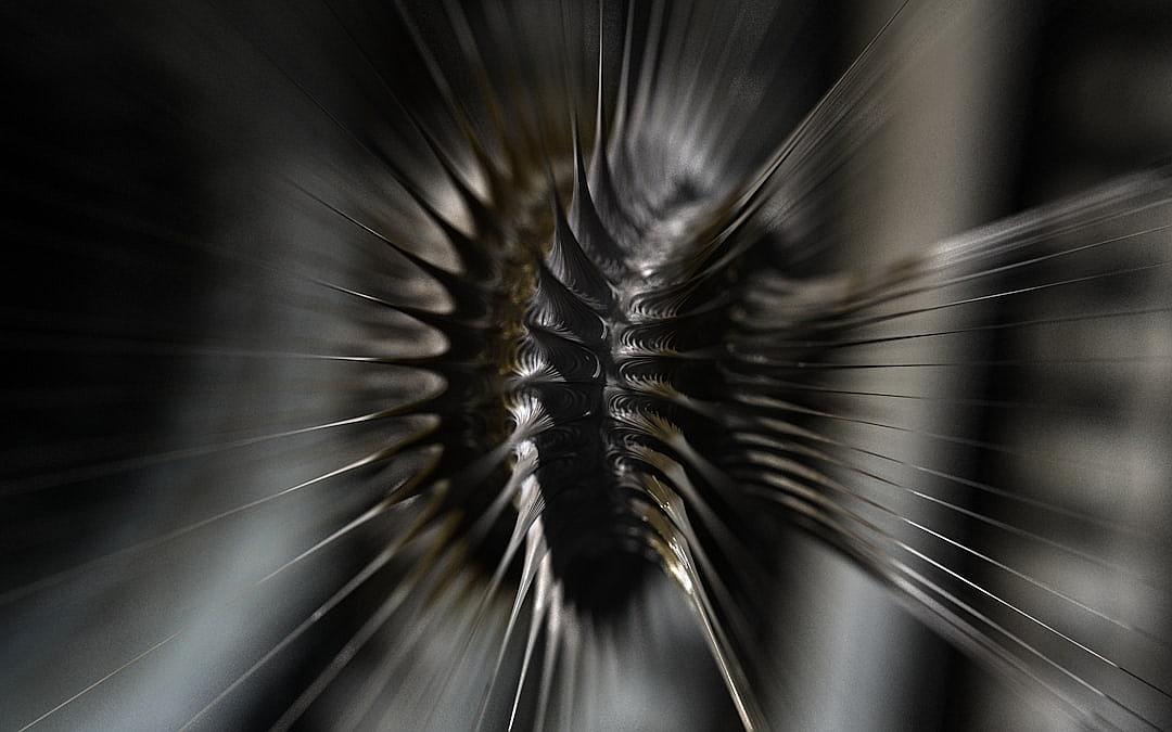 black and grey abstract photograph of sharp motion blur, hyperrealistic photography with sharp focus, an extreme low angle shot looking up at an alien with black spiky horns made of metal and chrome in the center of the frame, a closeup macro lens shot with low light and a dark background, motion blurred with black splashes on glass in a high contrast style.