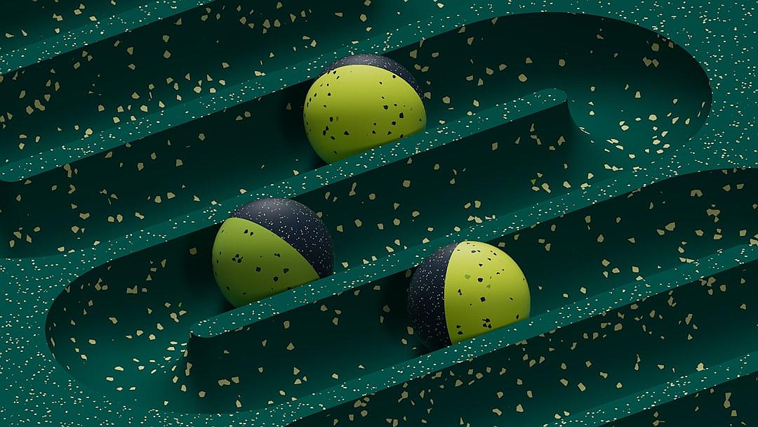 A closeup of three tennis balls rolling down an abstract green and navy blue terrazzo patterned wall, rendered in the style of [Eiko Ojala](https://goo.gl/search?artist%20Eiko%20Ojala), with a background of scattered gold glitter. The scene is captured from above with a wideangle lens, highlighting the contrast between the dark texture of each ball against the soft lighting. This design emphasizes the fluidity as well as the elegance of movement on the surface of the wall.