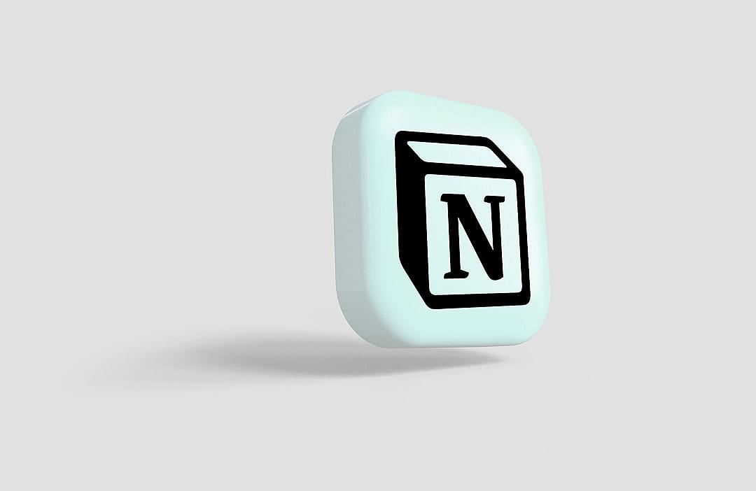 An icon for the app, with a white background and light blue and black colors, in a simple design with rounded edges in a square blocky shape. Within it is written “N”, where the letter N has been replaced by a symbol of paper with visible writing. The logo should convey innovation and technology while maintaining its simplicity and clarity, with a white background, in the style of a 3d render at high resolution.