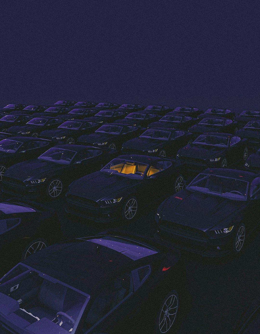 A lot of black Ford Mustangs in the parking lot, night sky in the style of Ryo Takemasa and [Junji Ito](https://goo.gl/search?artist%20Junji%20Ito), minimalism, pixel art with a dark blue purple background, top view wide shot from a high angle, front lighting, close up with soft focus, surrealism, digital painting, hyperrealistic and ultradetailed with volumetric lighting, sharp focus, octane render