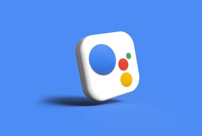 A simple and minimalistic app icon for the Google Home model, featuring an illustration of visual voice search with two buttons on one side, a large white square in front of it, and three colorful circle icons inside that symbolize touch screen gestures. The background is blue.