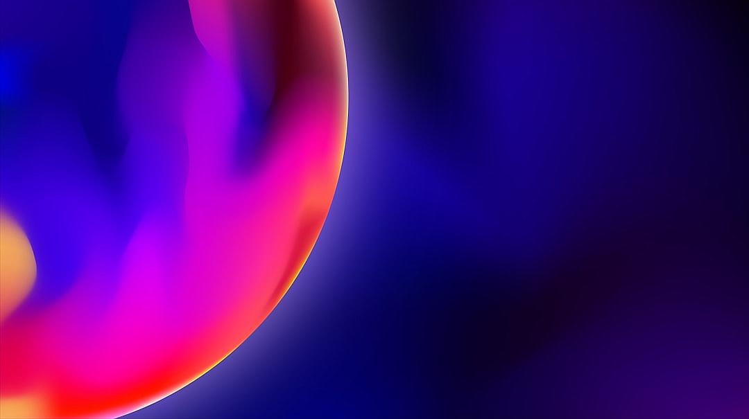 Abstract purple and blue background with blurred circular shapes, gradient of red, orange, pink, yellow, and orange colors, violet and dark blue background, light reflection, closeup and high resolution image in the style of a hyper realistic and super detailed artwork.