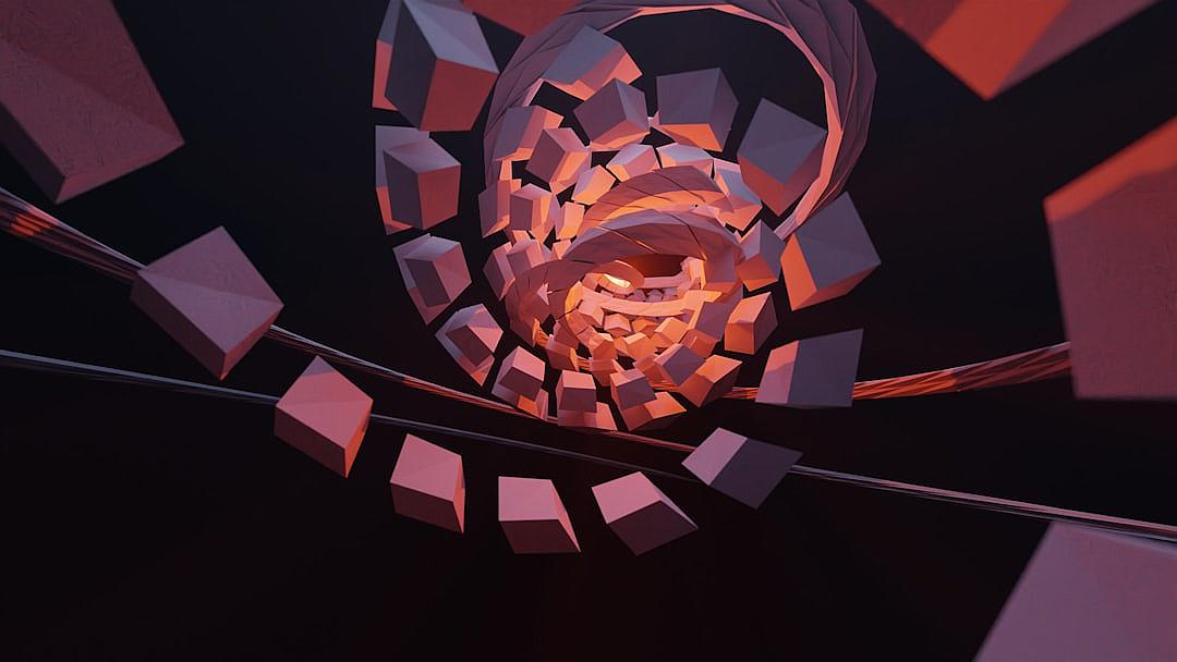 a lowpoly, black background with an orange and pink light swirl that is being deconstructed by cubed pieces floating around it. The perspective of the shot makes everything look like its in motion, almost as if you were inside looking up at the ceiling. It’s a closeup shot of the spiral so we can see every piece of cube, each one glowing from within