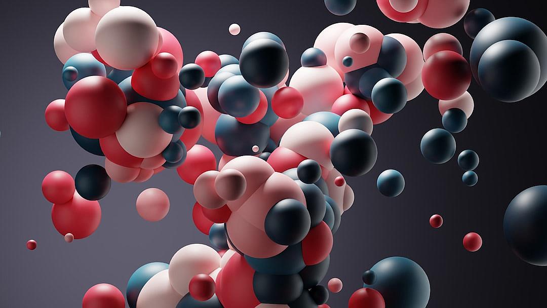 3D rendering of colorful spheres floating in the air. The composition is asymmetrical, with red and blue balls on one side creating an abstract shape that suggests movement or space travel. There is no background just dark grey, which gives it a surrealistic feel. It has an elegant and modern aesthetic with soft lighting that highlights each ball’s texture and form.