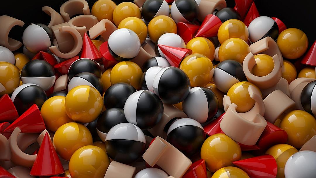 A pile of various colors and shapes, black, white, yellow and red balls with plastic cone shaped objects. Red and beige pieces. The balls have the same size as each other. A 3D render. Hyper realistic in the style of Octane Render. Unreal Engine V5.