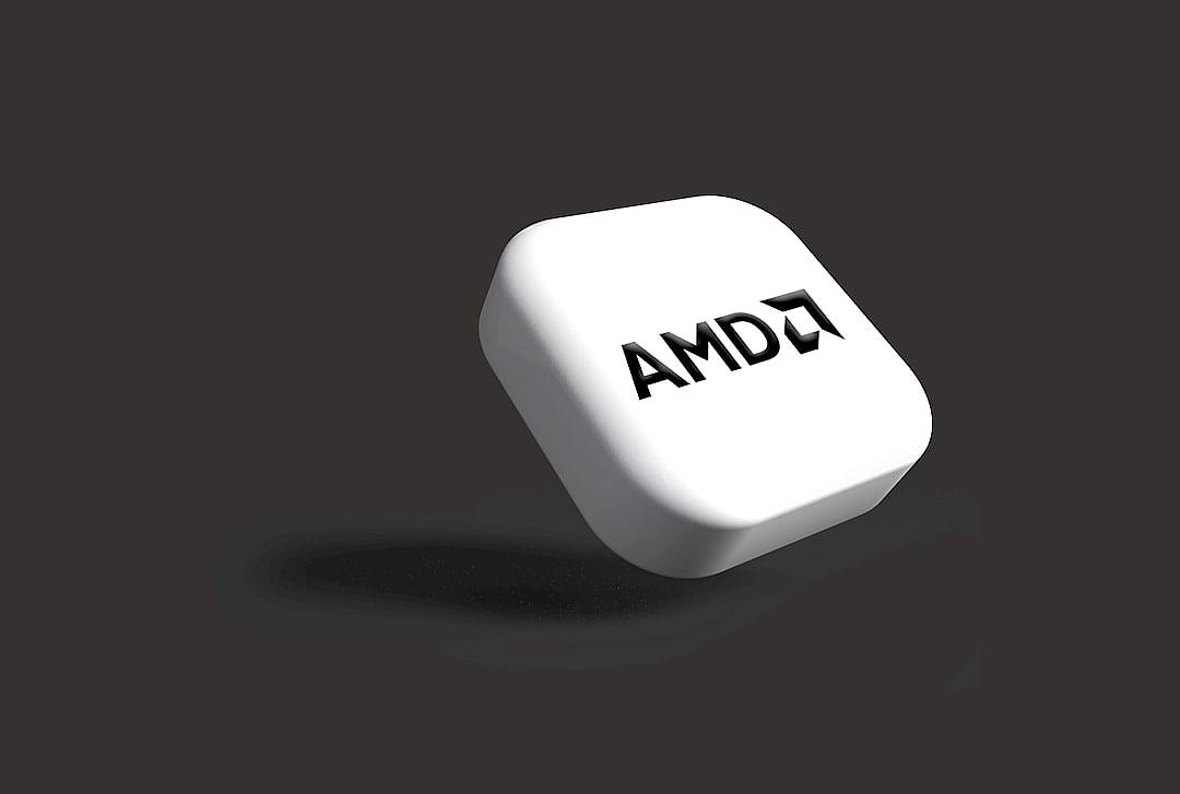 The white, matte surface of the white clay button with “Amb marque” text on it, floating in air against a black background in a 3D render. The rendering is high resolution, highly detailed, and high quality with high definition.