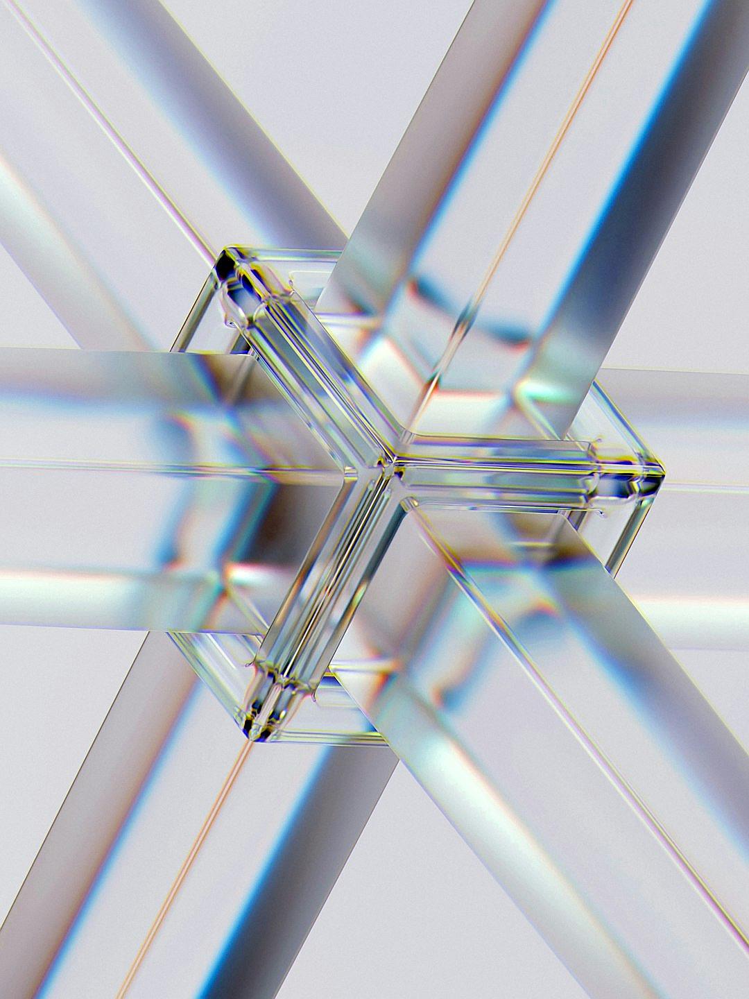 A closeup of an isometric cross, with the four prongs each composed of different materials and a single crystal in between them. The light rays from these crystals create reflections and refractions on a white background, producing intricate patterns and textures that give depth to the design. This perspective adds visual complexity while maintaining simplicity in the overall composition.