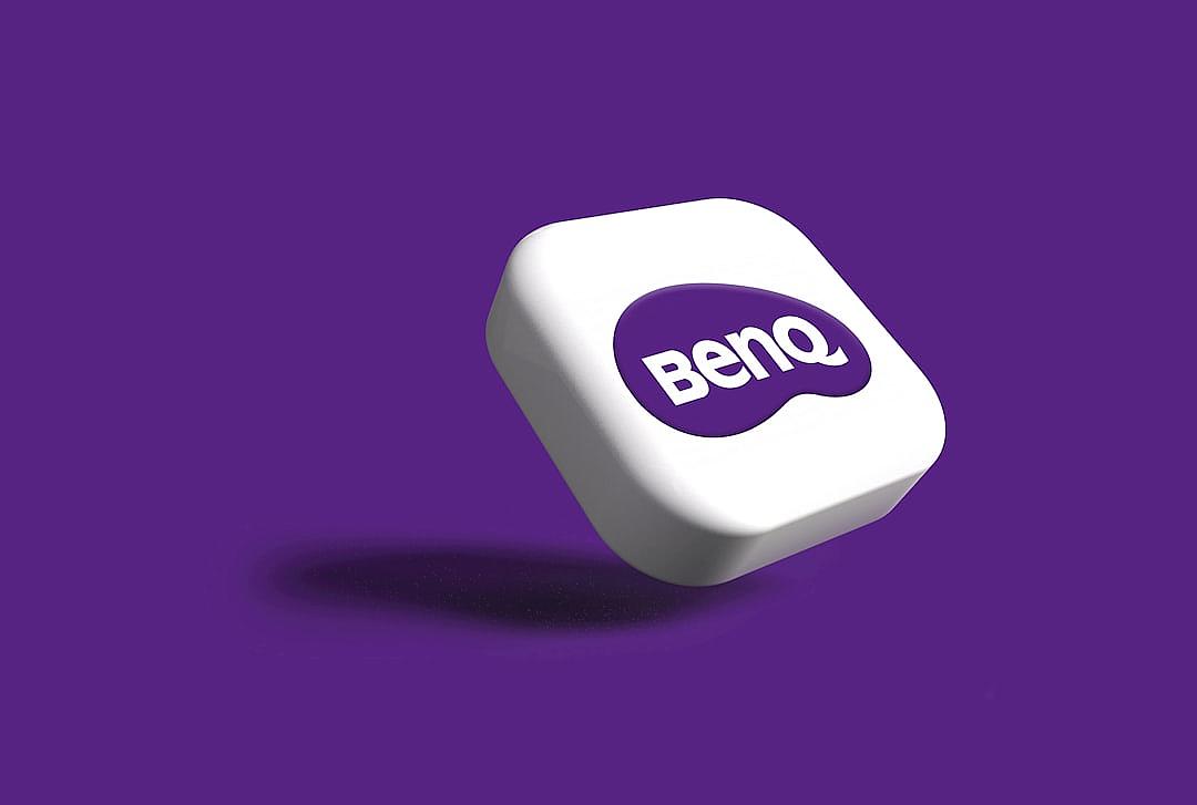 A white rounded square button with purple text “BENQ” floating in the air, on a solid background color. The icon is made clay material, a 3D blender render, with a clean and simple design, in a modern and creative style. It is set against a dark violet backdrop. There should be no shadows or lighting effects. In its center stands an elegantly designed app button with a subtle embossed effect for a sophisticated touch.