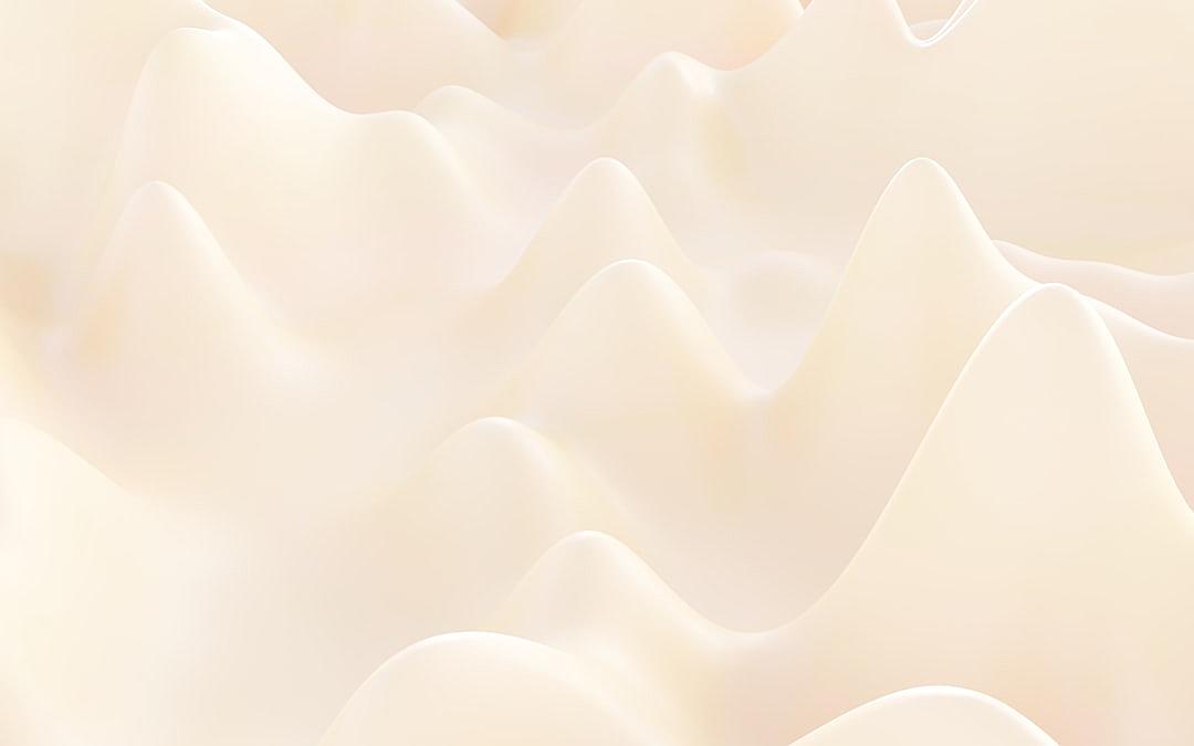 A white background with gentle waves of cream-colored hills, giving the impression that they have been carved from soft fabric. The curves and contours add depth to create an abstract yet realistic landscape, perfect for product packaging or digital backgrounds.