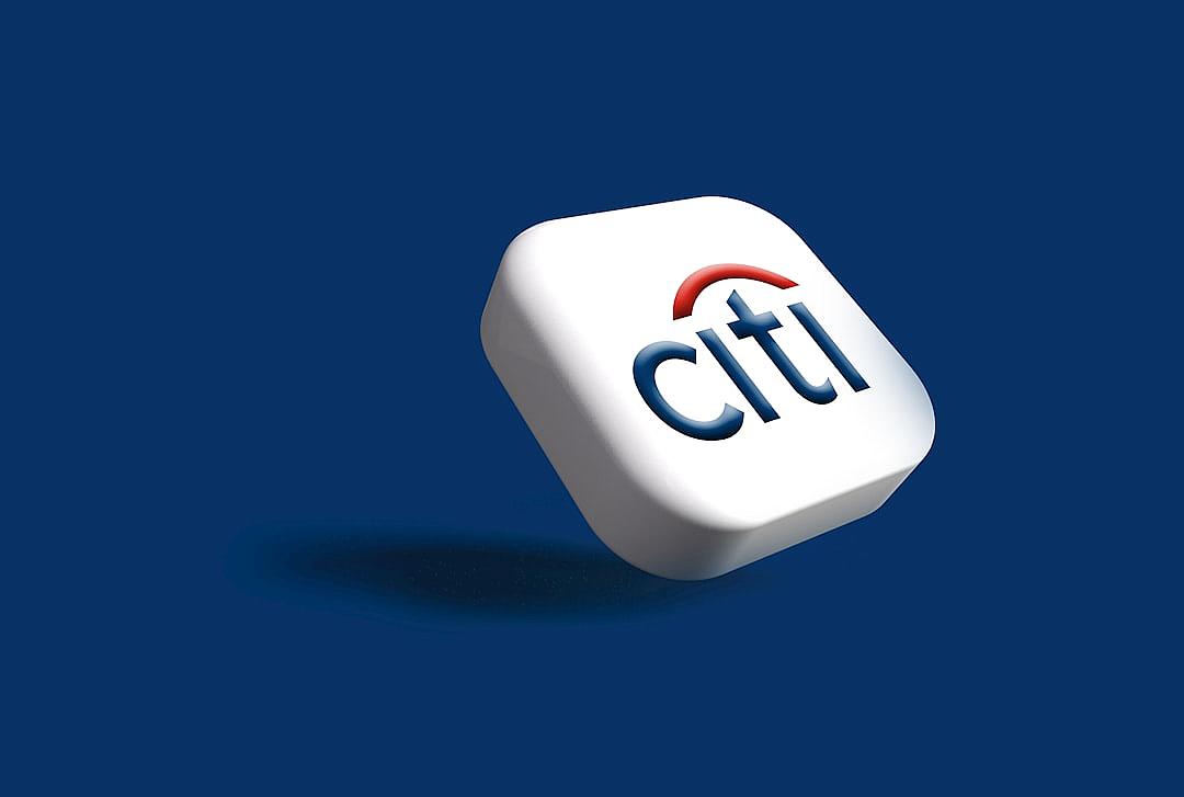 simple logo of the white Citi bank app icon, blue background, “CITYnumbers” written on it in red letters, 3D render, high resolution photography. “CITYnumbers” written in the style of red letters.