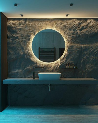 Bathroom with wall in the form of an abstract relief made from sand, there is also round mirror on it and sink above the countertop, there's blue light coming out from under the cabinet lights, front view, ultra realistic photography