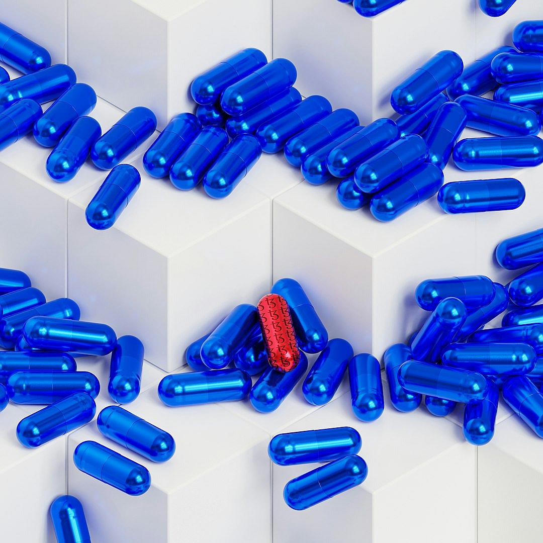 A pile of blue pill tab in shape of cube, one red capsule on top of the pills, all set against white background. The overall composition should convey an atmosphere of modernity and sophistication, with the focus being placed on the vivid colors of both pills and tablet. The use of geometric shapes like cubes adds to the visual appeal while maintaining simplicity.