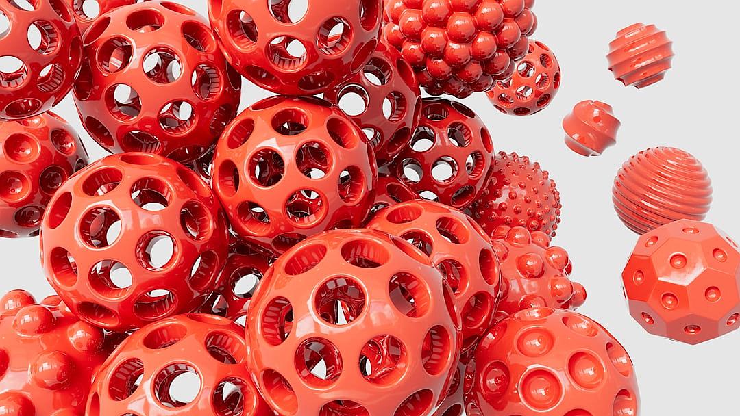 3d rendering of red spheres with holes on them, scattered in the air. The background is white and has some elements that resemble fruits or flowers. In the foreground there’s an object resembling plastic balls, covered by the same material as other objects. This object appears to be made from different materials such as metal, wood, glass and concrete. It also seems to have multiple shades of color, which adds depth to its appearance.