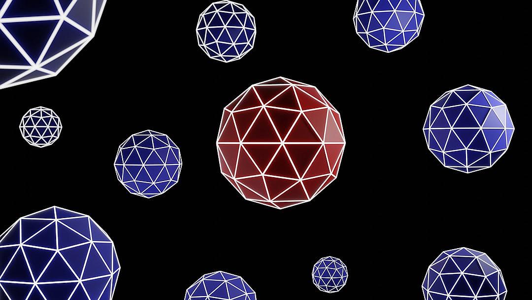 3D render of white and blue geodesic spheres floating on a black background, with a red sphere in the middle. The spheres are of varying sizes and the style is reminiscent of works by [Buckminster Fuller](https://goo.gl/search?artist%20Buckminster%20Fuller).