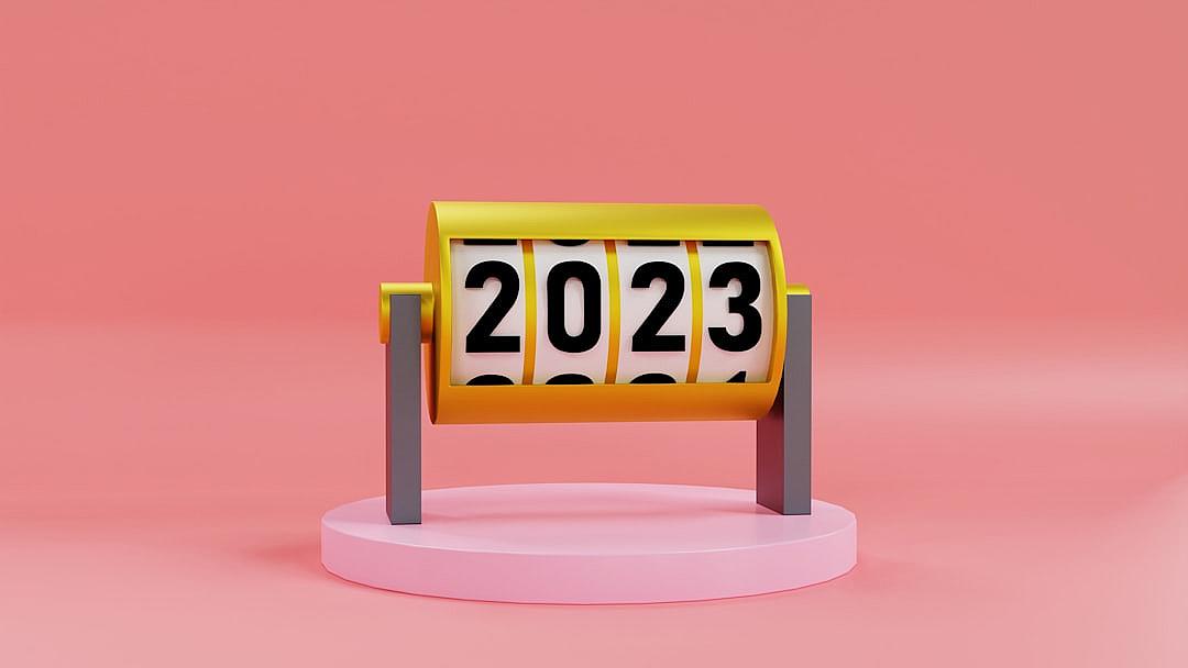 Cute number “2023” shaped flip clock on pink background, 3d illustration in minimalistic flat style