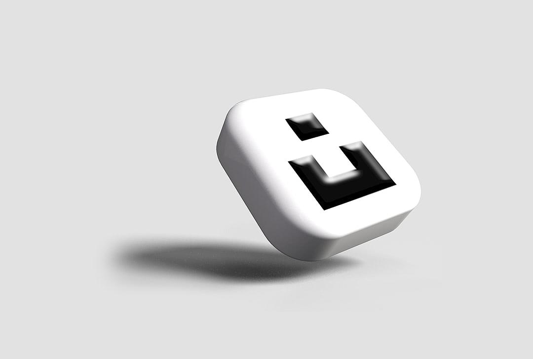 3d icon of white cube with black “i” on it, floating in air, white background, minimalistic style, high contrast, simple shapes, monochromatic color scheme, no shadows, no gradients, smooth textures, frontal view, centered composition, high resolution