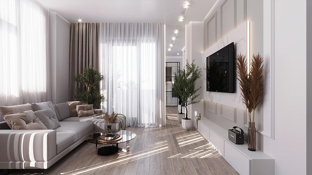 modern interior design with a light gray and white color scheme. The living room has a sofa and tv on the wall, with a wood floor and soft lighting. White curtains and plants in pots give the space a minimalist style. Renderings show the front view at a 45 degree angle of elevation, creating a warm atmosphere. The wooden flooring and natural elements complement the white walls, white ceiling, and white TV hanging on one side of the window, in the style of minimalism.