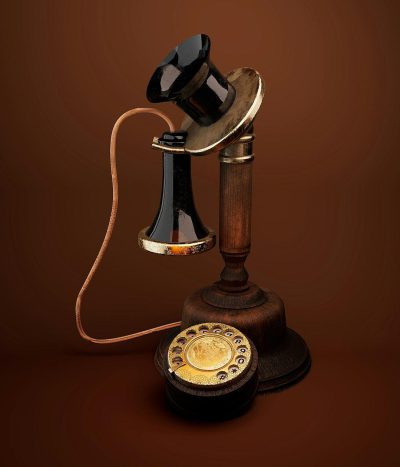 A vintage candlestick telephone with an antique black and gold color, solid brown background, isometric view, studio lighting, high resolution photography, insanely detailed, fine details, isolated plain, stock photo