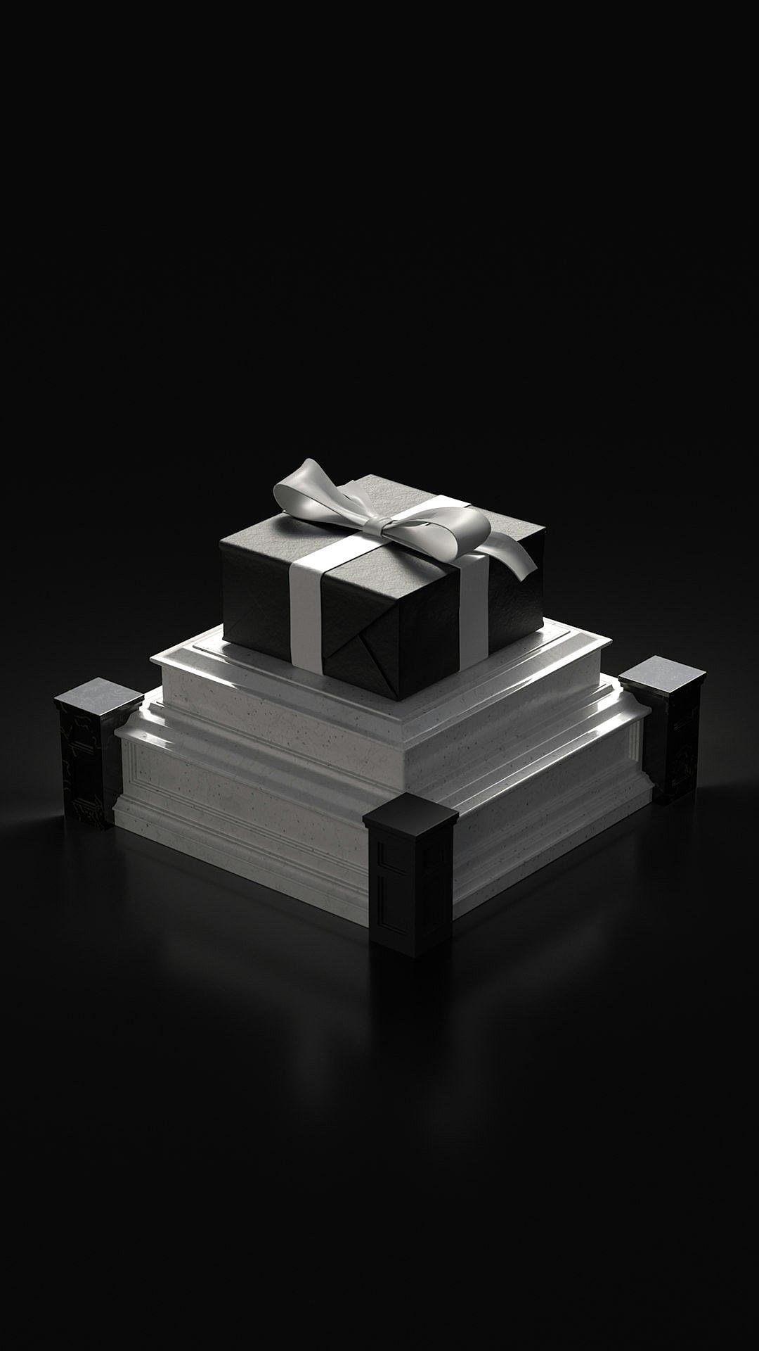 A modern, monochromatic 3D rendering of an elegant gift box sitting atop three books against a dark background. The box is wrapped in silver ribbon and sits atop the stack with its lid open to reveal white pages inside. It is positioned at one end of a rectangular pedestal that has four short black blocks arranged around it, creating an asymmetrical balance. This composition creates a sophisticated atmosphere suitable for a holiday card or invitation design in the style of a minimalist artist.