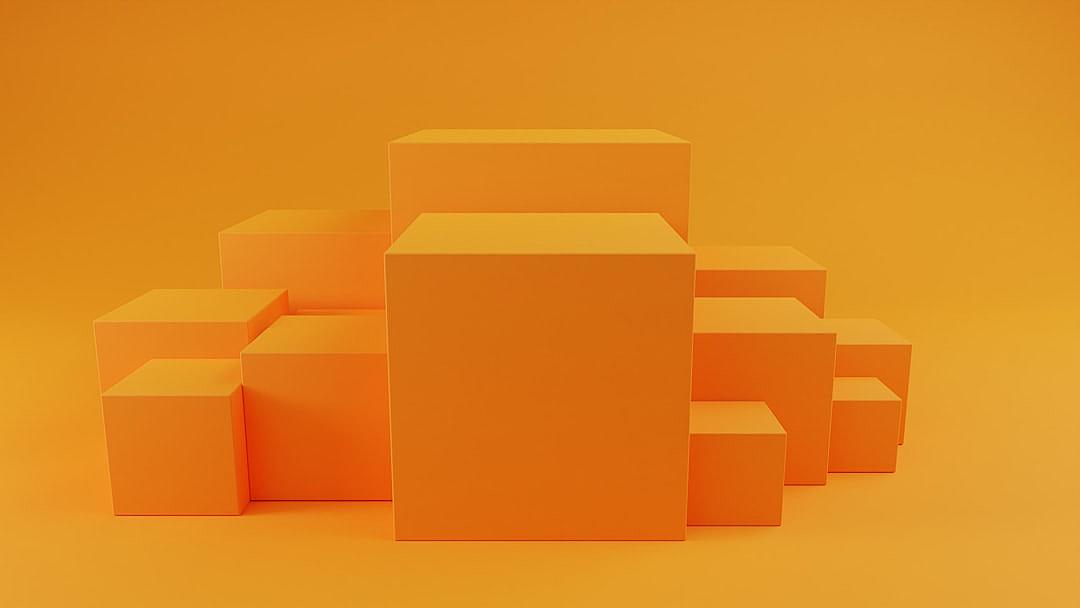 A set of orange boxes are arranged in an asymmetrical pattern on the right side against a solid background. The box shapes and sizes can be different from each other, creating visual interest with a dynamic arrangement. The overall composition is simple yet visually appealing due to its clean lines and vibrant color palette.