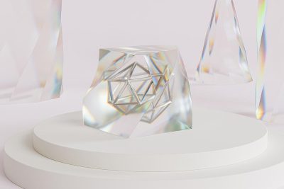 A geometric shape made of crystal glass stands on an elegant white podium, surrounded by soft light and holographic rainbows. The design is minimalistic yet striking with its intricate patterns and shimmering effects. It symbolizes the beauty in simplicity and depth that harmony brings to life's journey., ultrarealistic photograph captured, highresolution 3d rendering