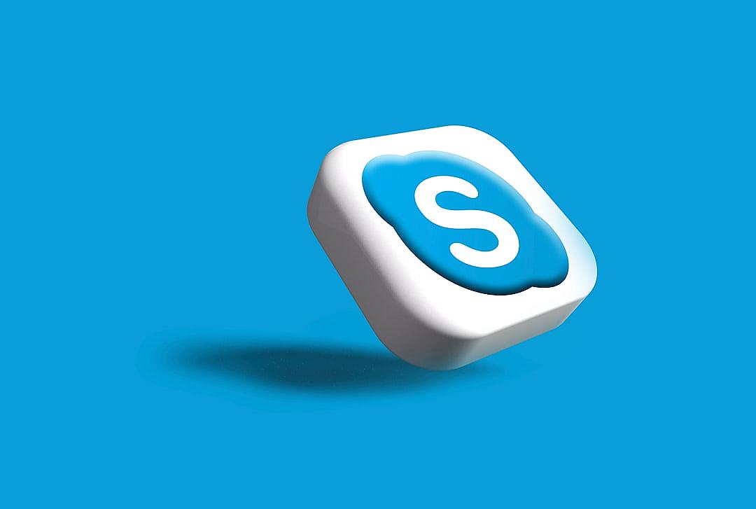 3D icon of telecommunication in the style of Anthropic on a blue background, with a white and light blue color scheme and Skype logo, rendered with Octane, floating in the air in an isometric view without shadows.