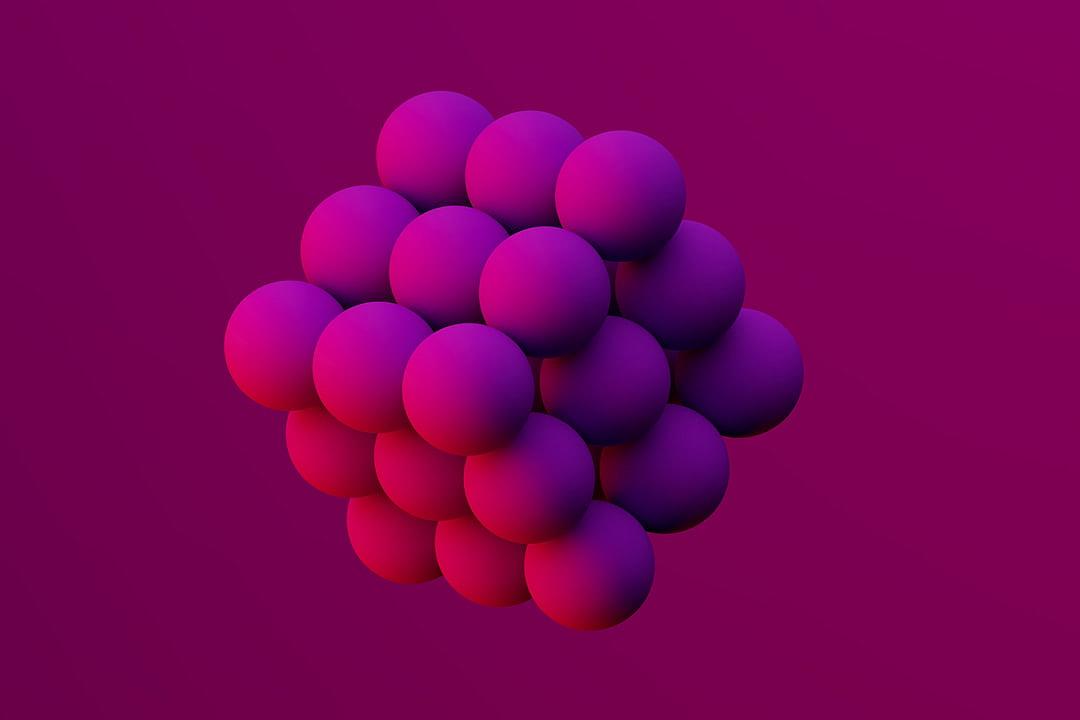 A minimalistic purple and pink gradient background with a cluster of spheres, rendered in the style of Cinema4D. The composition is a simple yet striking design that captures the essence of digital artistry.