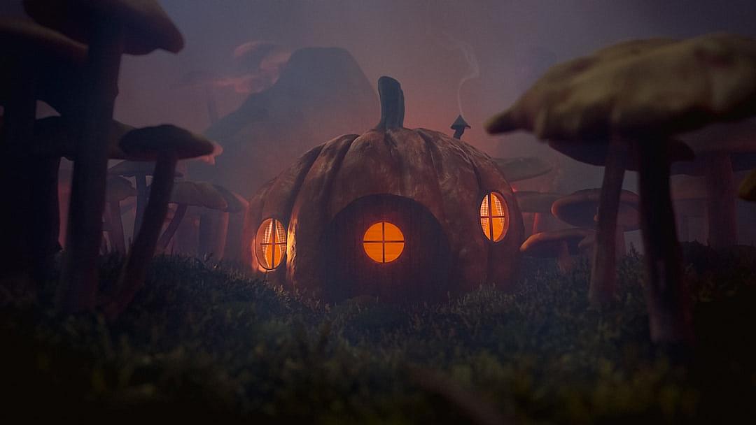 A small house made of pumpkin, surrounded by mushrooms in a foggy night, with a cinematic style, in the style of unreal engine.