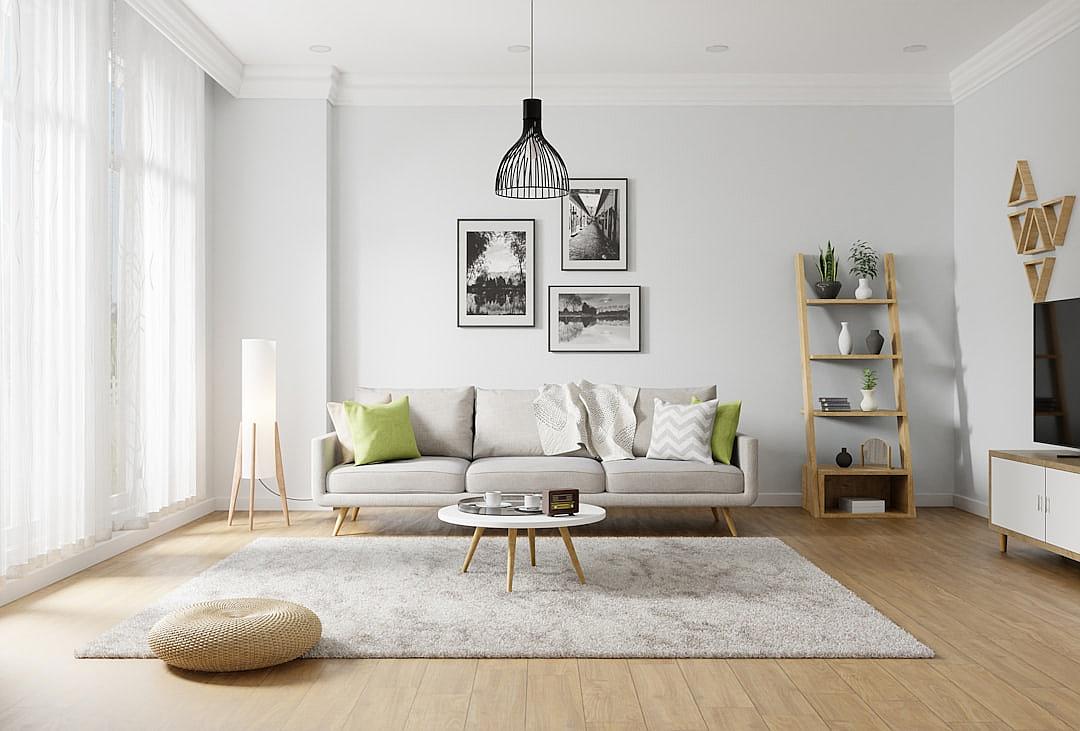 Minimalist Scandinavian living room with a light wooden floor, white walls and sofa, green pillows, a black pendant lamp and pictures on the wall, bright natural lighting, 3D rendering, high resolution, highly detailed, high quality images in the style of different artists.