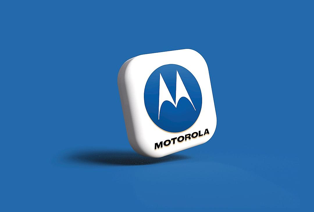 A white square with the Motorola logo on it, on a blue background, rendered in the style of blender, with a simple and minimalistic design, in an isometric view, with a white border around each edge of the icon.