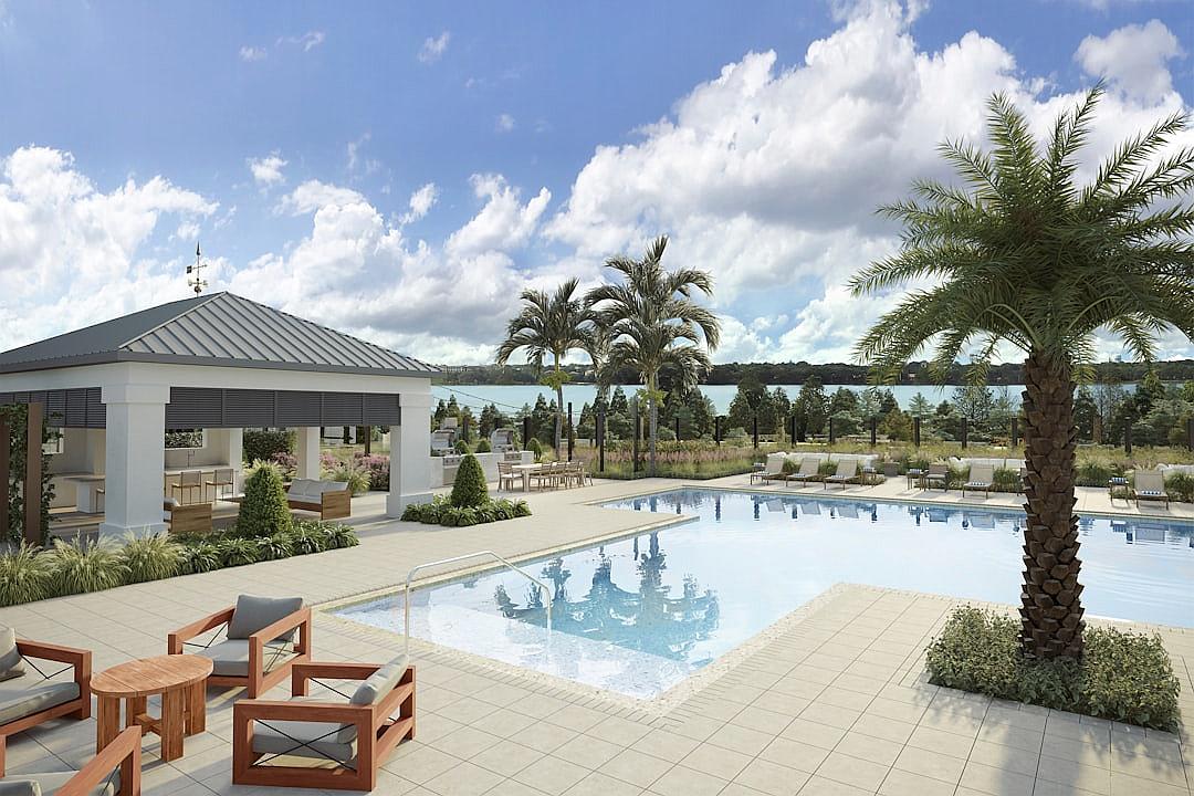 create an architectural rendering of the outdoor pool area with sitting chairs and gazebo at luxury residential community in Florida, overlooking lake, palm trees, light grey tiling on floor, swimming pool with white surroundings and blue sky, lots of greenery, small bar table and seating lounge areas around it