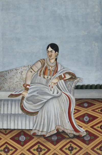 A classical painting of an Indian woman sitting on the edge of her bed, wearing a white saree with a red border and pearls around her neck, seated in a large open space with patterned floor tiles and a blue sky background, viewed from the front in the style of a classical Indian artist.