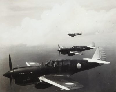 Old black and white photo of Japanese P40 WarHorns flying in formation over Japan, 2 World war 2 fighter planes flying side in the style of side, 3 World war 2 airplane, 5 world war two aircrafts, vintage photograph on film, old black & White photography, very detailed photo realistic photography, very sharp focus, very high resolution, very intricate details, very good detail