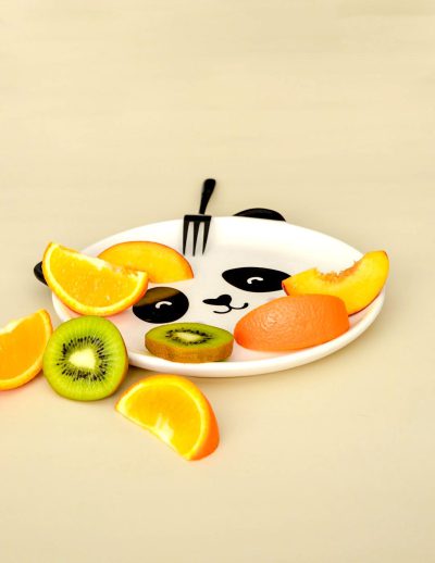 Cute panda plate with fruit, orange and kiwi slices on the side, beige background, minimalist style, product photography in the style of studio lighting, high resolution, high detail, high quality, high definition image, best quality, 20k