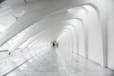 white modern architecture, white arches, long corridor, architectural photography