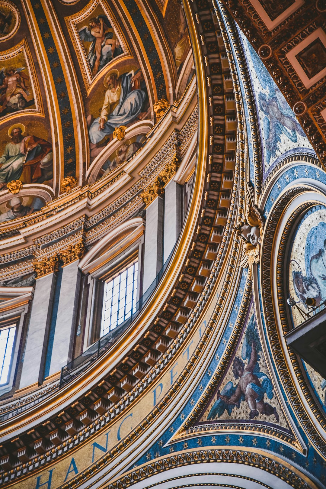 photo of vicaress in the dome of st peters, renaissance paintings on the walls, intricate details, beautiful composition, blue and gold color scheme, low angle shot, taken with a sony alpha a7 iii in the style of renaissance artists –ar 85:128