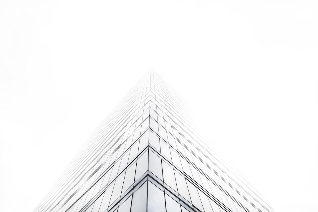 White background, foggy skyscraper corner, simple and minimalist style, high resolution photography, architectural photography, archdaily photography, clean sharp focus, f/28mm, Sony Alpha A7 III