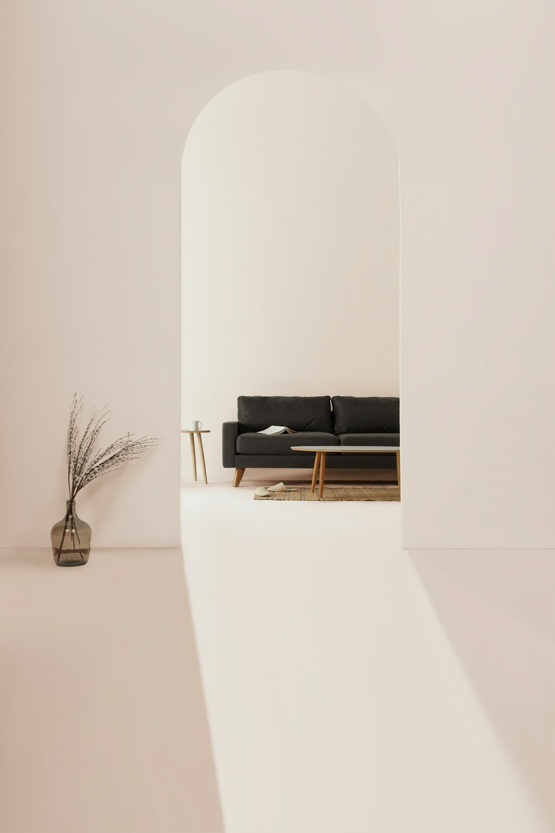 minimalist interior design, living room with white walls and a black sofa, minimal furniture, an arch wall in the background, a simple composition, natural light, neutral tones, a wide angle shot, architectural photography in the style of an architectural photographer. –ar 85:128