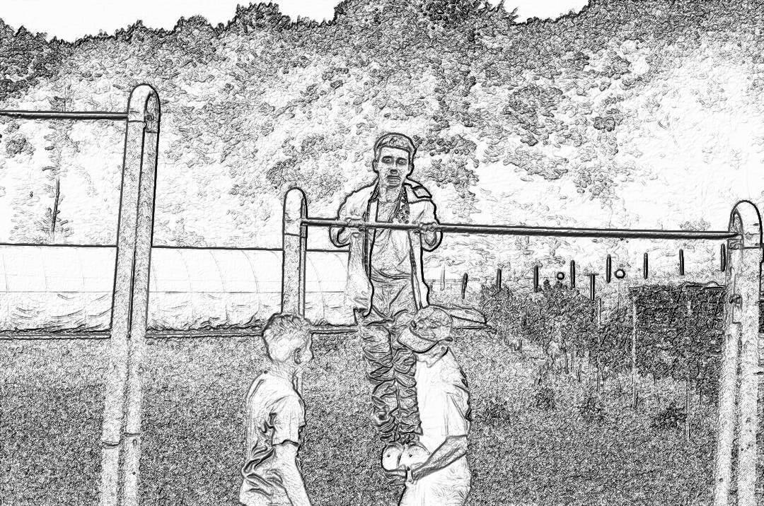 A black and white storyboard sketch of an extreme close up shot from the perspective looking down at two kids playing on monkey bars in front, one kid is climbing while another child stands holding onto bar with arms outstretched as if to help their friend