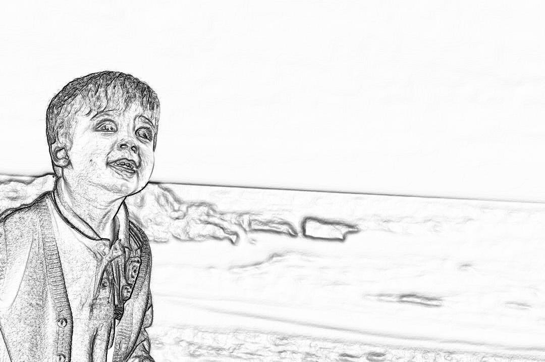 A young boy, smiling and talking to the camera on his birthday at sea beach in India, storyboard pencil sketch style