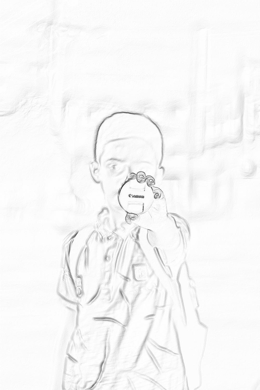 A rough pencil sketch of an adorable little boy, holding up his tiny DSLR camera and taking pictures. The background is white with soft shadows that accentuate the features in detail. He’s wearing casual , adding to the innocence of the scene. The focus on details captures every subtle expression on their face as they capture a moment in time. by minimalist style, coloring page