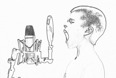 A simple pencil drawing depicts an open mouth speaking into a microphone, with one hand holding it up to his ear, and on a white background. The boy is wearing shorts and has short hair combed back in a low ponytail. He appears very focused as he presents his pitch. It's set against a solid white backdrop. In front there should be a closeup view of two microphones attached together by black wires, with their metal heads facing upwards in the style of him.