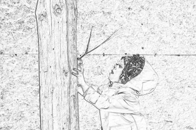 Black and white storyboard sketch of young child trying to reach the top, wooden post on wall with long pole