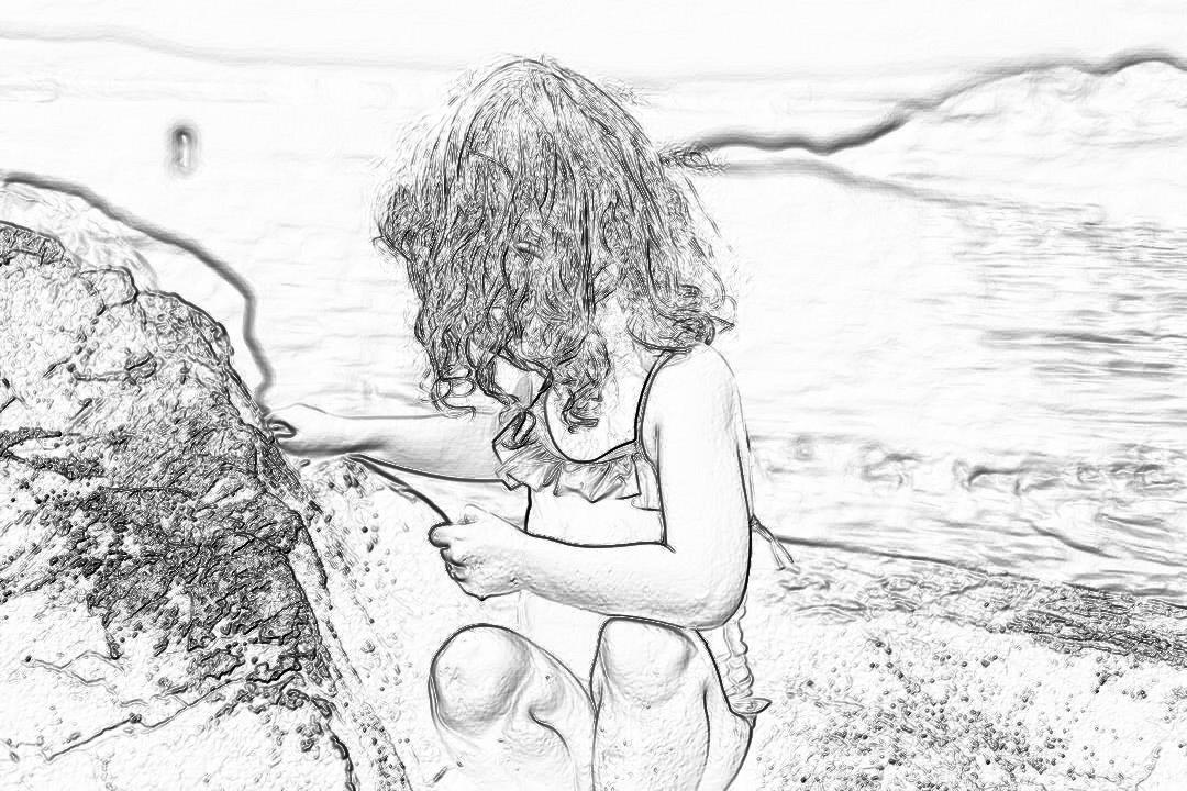 A girl with curly hair is playing on the beach, drawing by minimalist style , black and white color only in pencil lines , coloring page for kids under 6 year old, thick line, low detail, no shading . She has her hands folded across his chest as she looks down at an object sitting between them. The background shows gentle waves crashing against rocks along the shore. It’s a bright day outside, with sunlight casting long shadows over everything around. full body