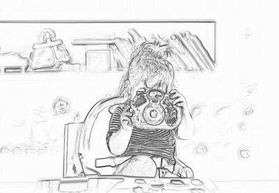 a rough pencil sketch of a girl with messy hair sitting at her desk, taking pictures in the mirror using an old camera. She is wearing striped top and jeans . The room has lots of photo equipment on shelves behind her.