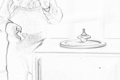 A pencil sketch of an adult woman standing next to the table with her hand on his stomach, looking at spinning top placed in front of him on the white tabletop. The focus is on the wooden spinning top and its sharp point that glows slightly from behind. No background, just pure white color.